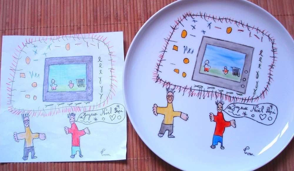 Assiette plate Elysée en porcelaine personnalisée d'après le dessin d'un enfant.